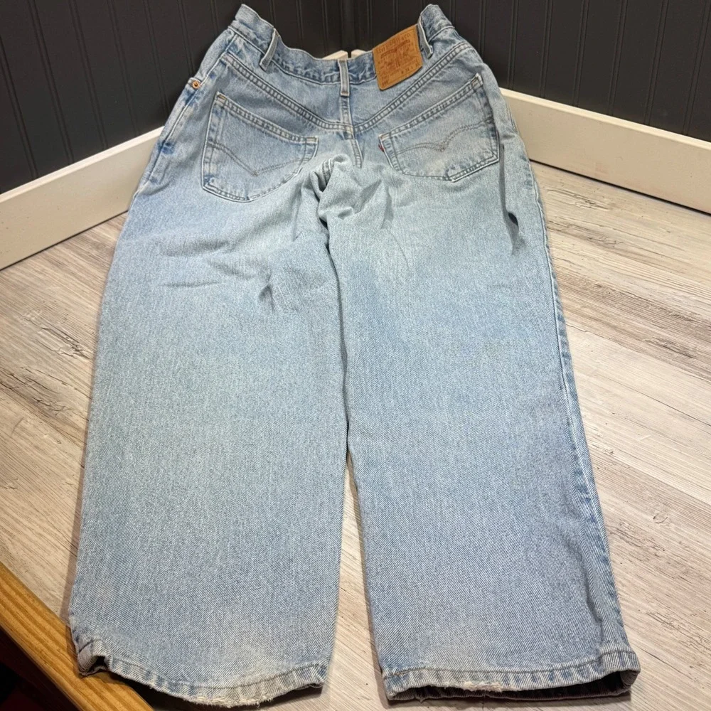 VTG Levis 560 Jeans Mens 34x30 Blue Relaxed Tapered Light Wash Made In USA Bat‎